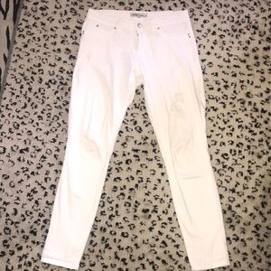 White jeans with distress detail